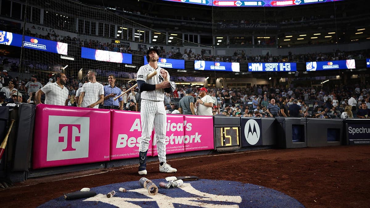 Ryan McMahon stands in the on-deck circle at Yankee Stadium.