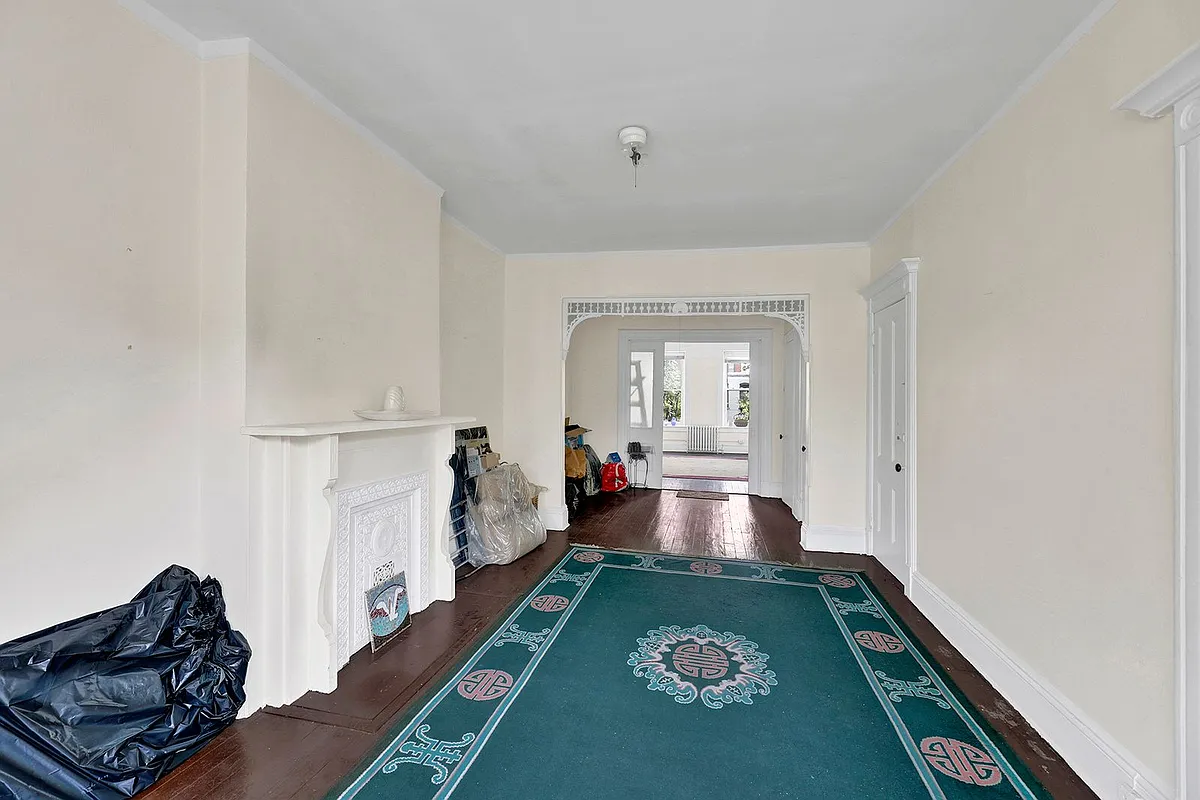 room with mantel, fretwork