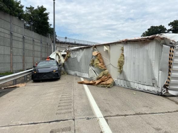 Over-Height Mack Truck Strikes I-87 Bridge, Overturns Before Slamming Into Toyota: NYSP
