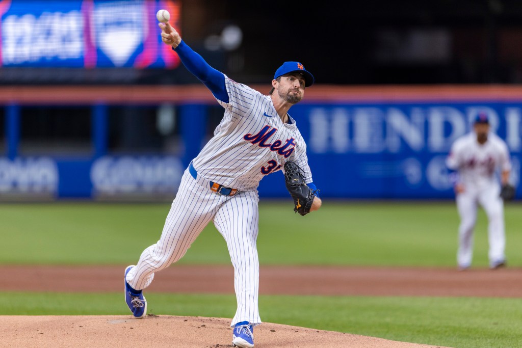 New York Mets pitcher Clay Holmes throws a pitch.