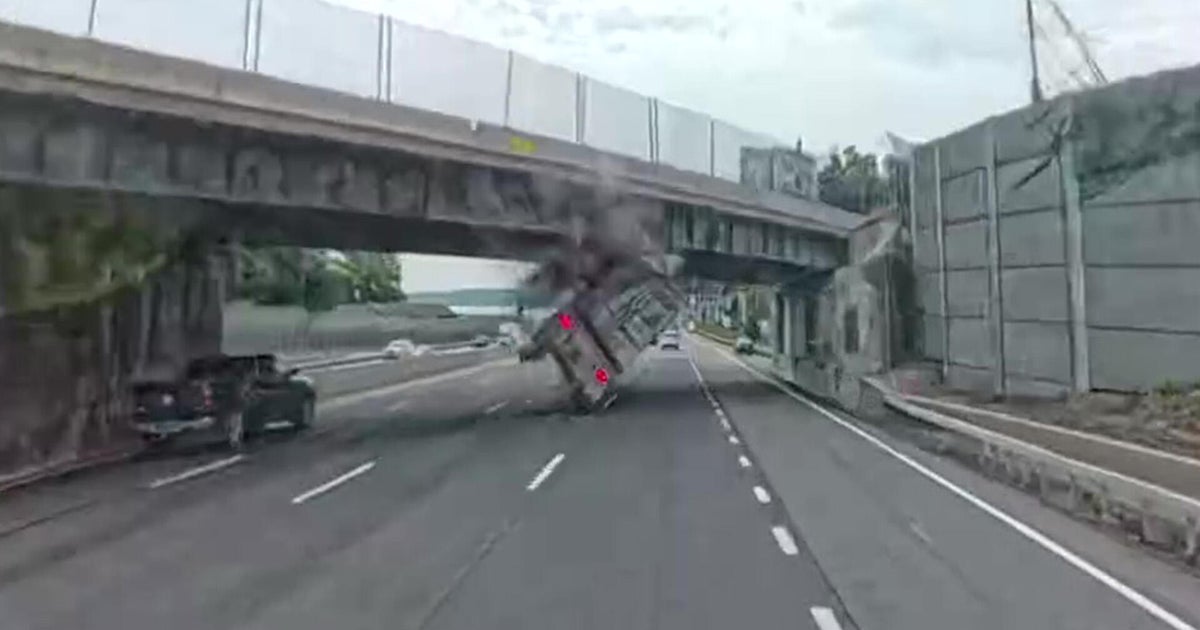 Dramatic video captures tractor trailer hitting Thruway overpass in South Nyack, N.Y.