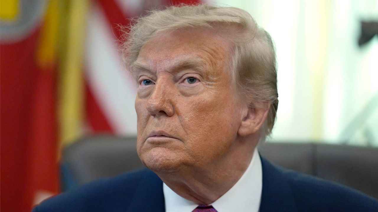 President Donald Trump listens to a question from a reporter in the Oval Office of the White House on Thursday, Aug. 27, 2026, in Washington. (AP Photo/Manuel Balce Ceneta)