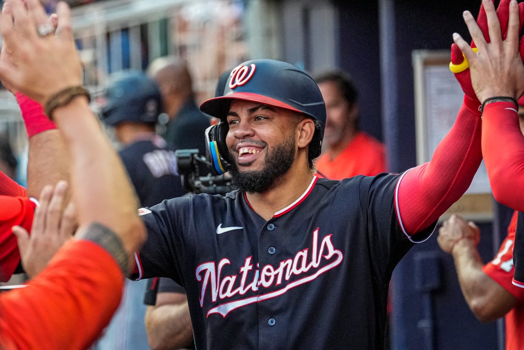Washington Nationals first baseman Luis García Jr. (2) celebrates in the dugout after hitting a home run against the Atlanta Braves.