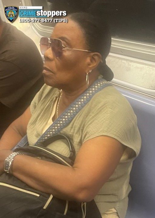 Cops are looking for this suspect, who remains at large nearly a month after she allegedly menaced a fellow E train rider with a knife during a heated argument. 