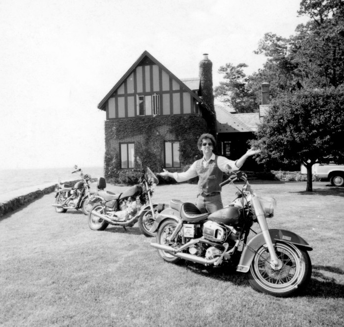 Billy Joel poses with his motorcycles during a photo shoot for “Songs in the Attic” at Gate Lodge on Sept. 14, 1981.