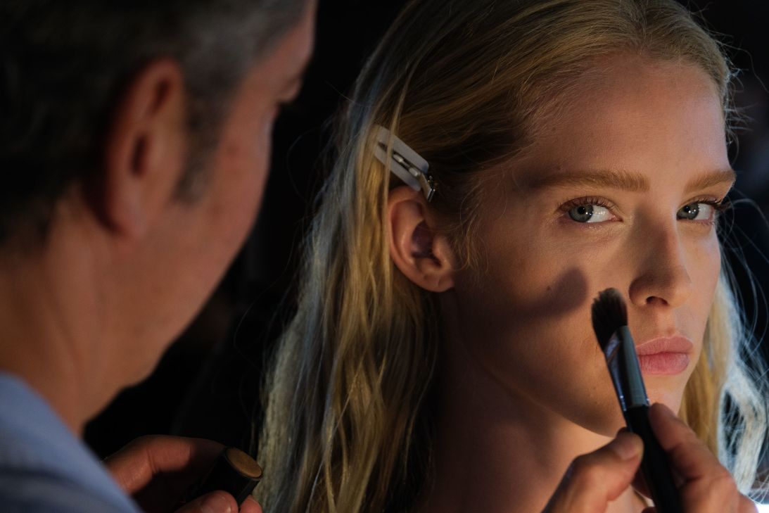 Finishing touches at the Tommy Hilfiger show.