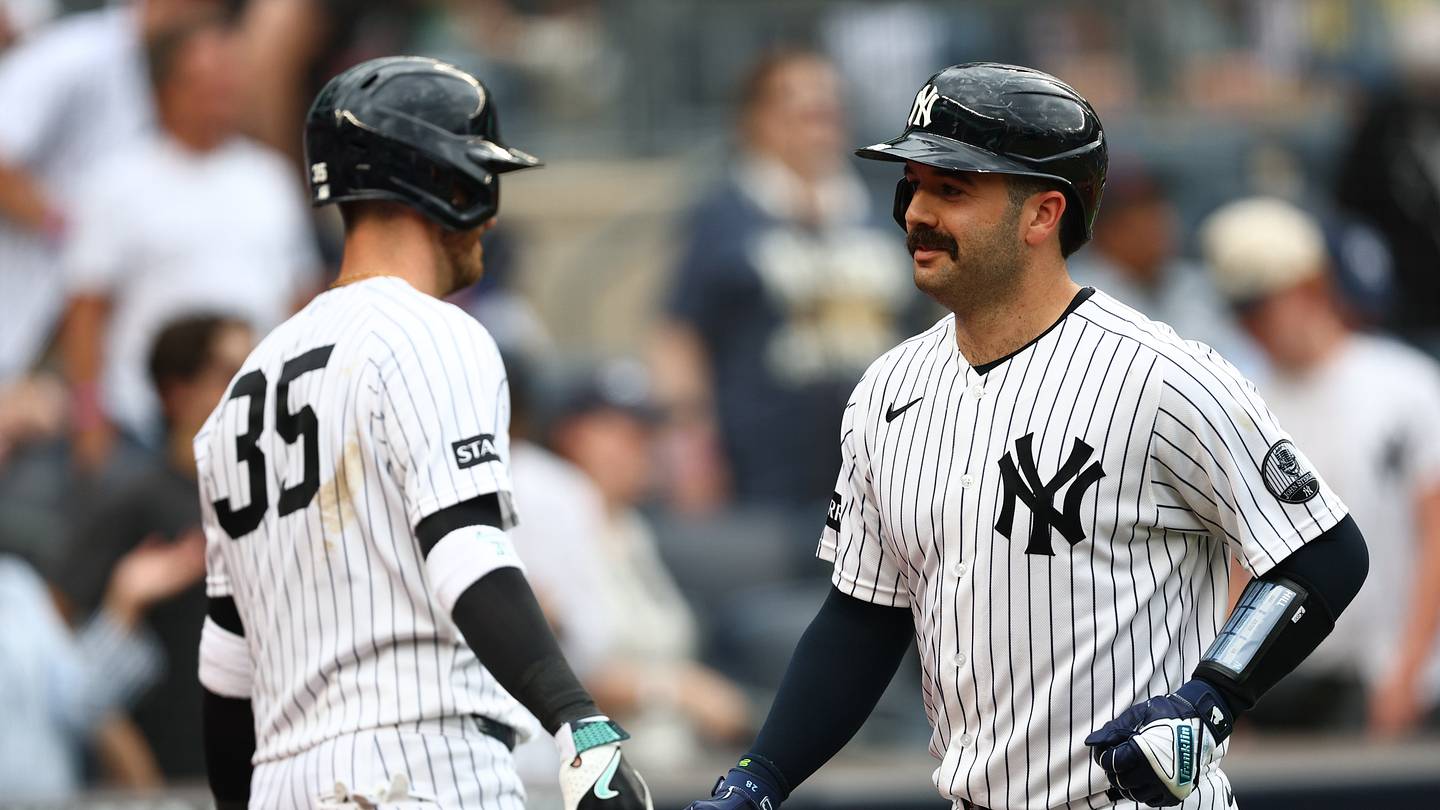 Aug 30, 2026; Bronx, New York, USA;  New York Yankees catcher Austin Wells (28) is congratulated by outfielder Cody Bellinger (35) after hitting a home run during the eighth inning against the Boston Red Sox at Yankee Stadium.  Mandatory Credit: Vincent Carchietta-Imagn Images