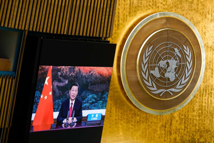 Chinese leader Xi Jinping is seen on a video screen as he addresses the 76th session of the United Nations General Assembly on September 21, 2021. The virtual address was the last time Xi spoke at the UN General Assembly.