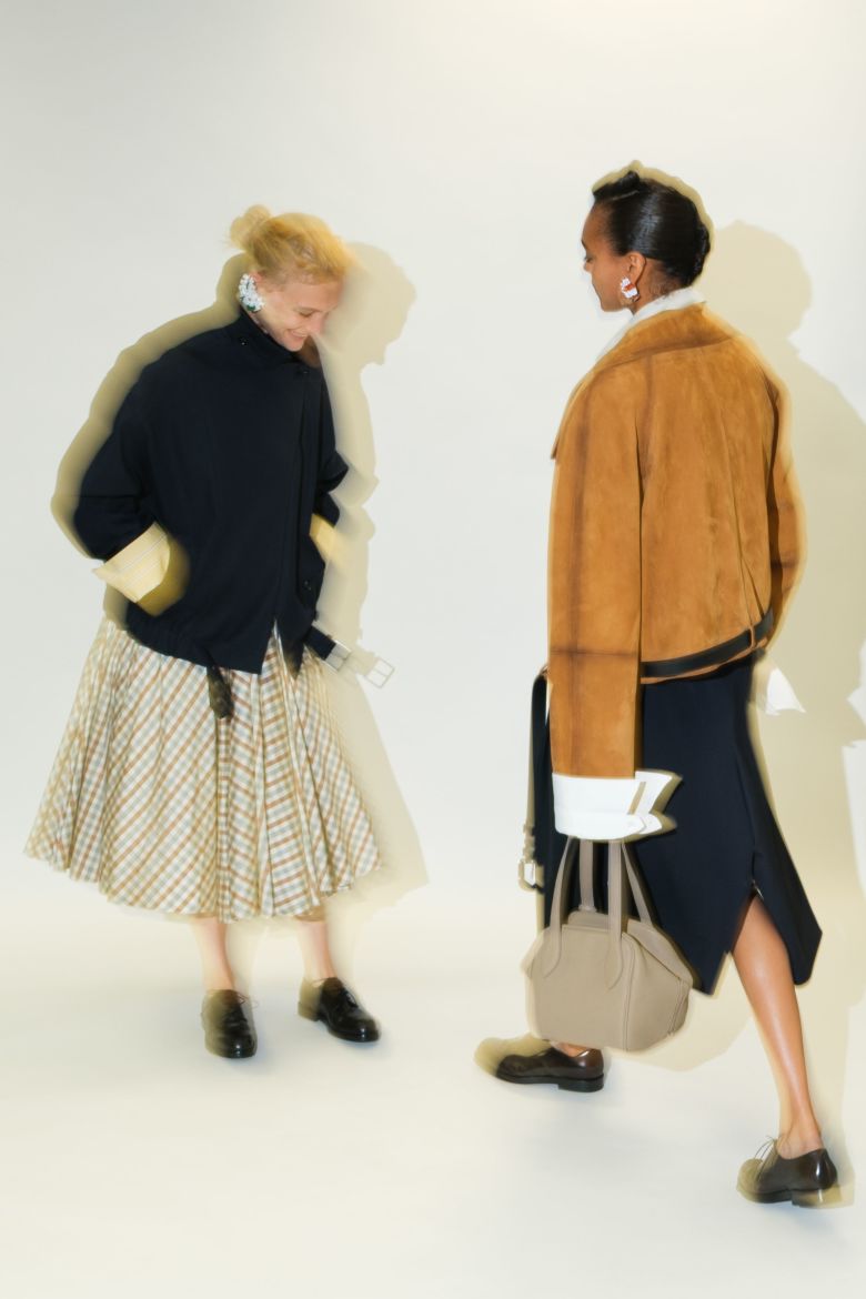 Slouchy bomber jackets paired with prim midi skirts at Altuzarra.