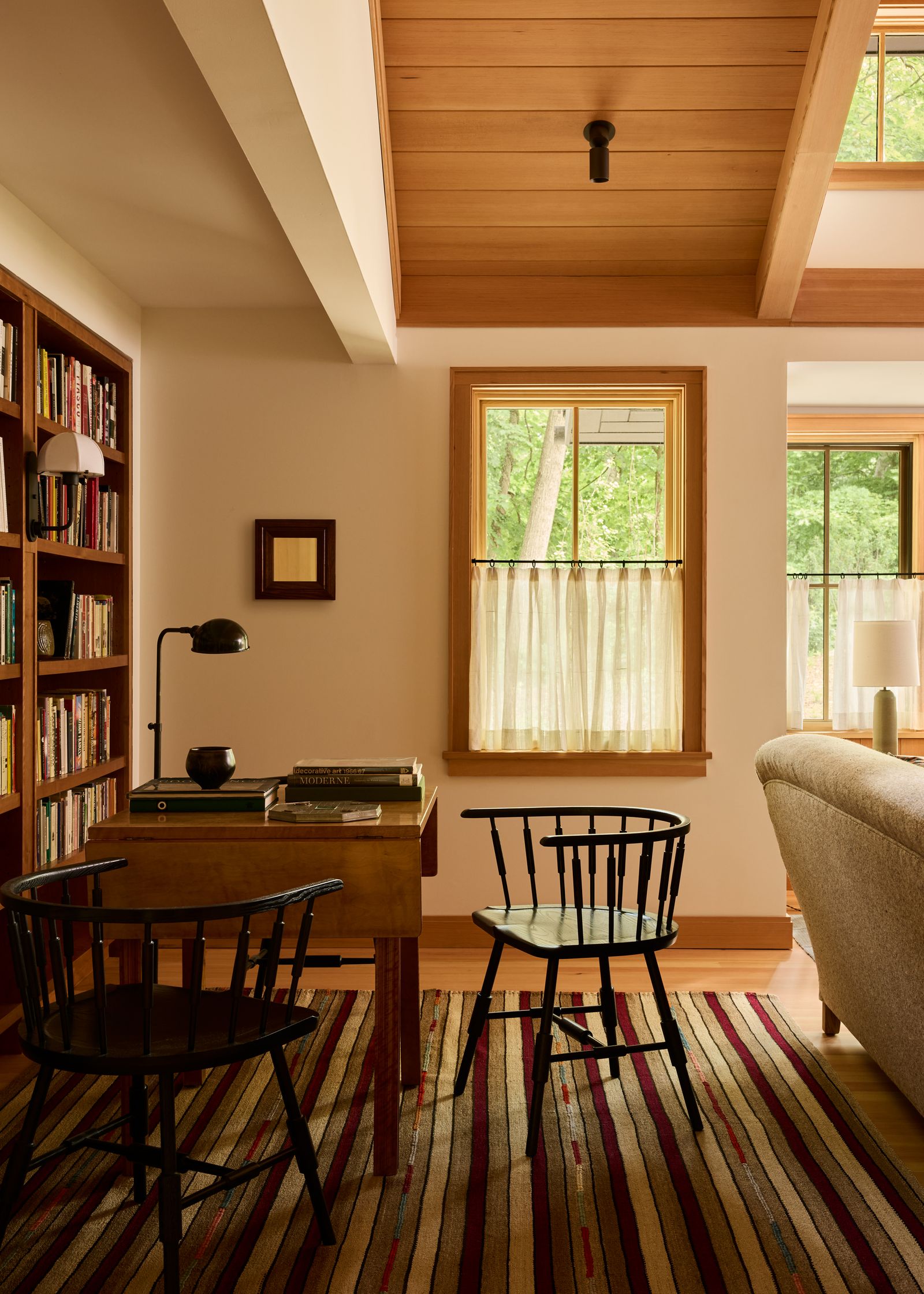 Image may contain Indoors Interior Design Home Decor Chair Furniture Table Wood Architecture and Building