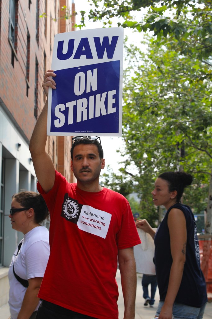 Bronx Defenders organized with the UAW walk the picket line outside the legal group’s offices on East 161st Street,