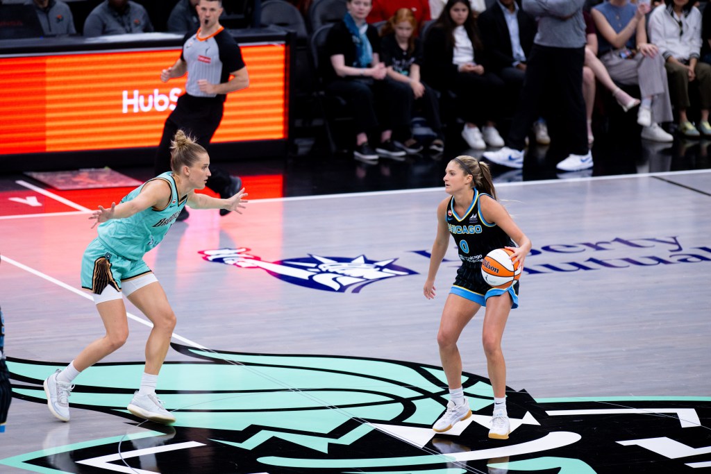 Leonie Fiebich guards Jacy Sheldon at the top of the Liberty's offense.