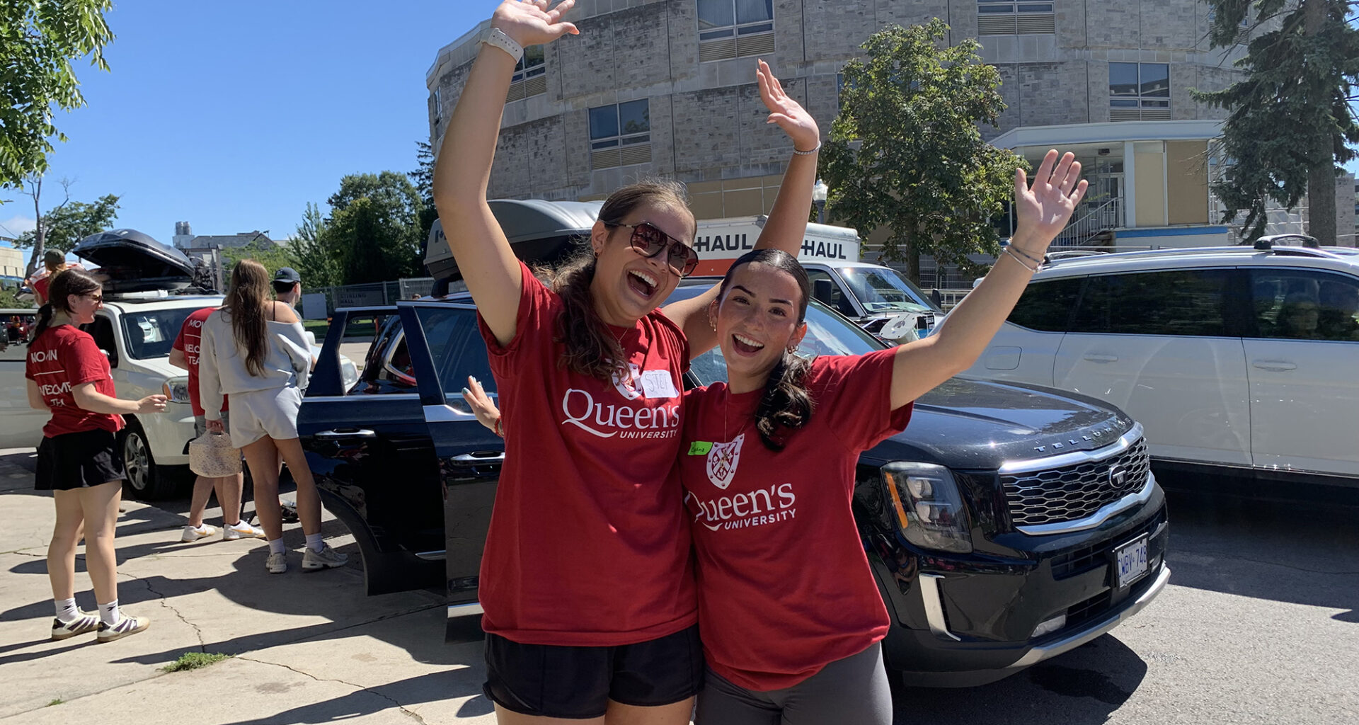 two girls cheering