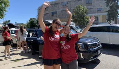 two girls cheering