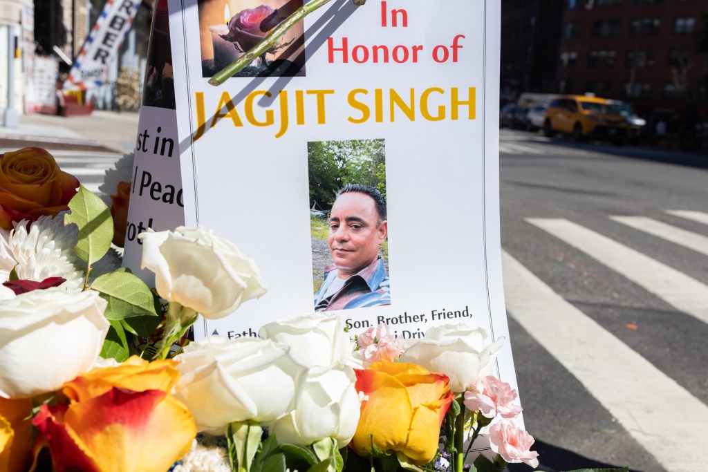 Taxi union members mourn the death of Jagjit Singh who suffered a heart attack while his cab was parked in the West Village