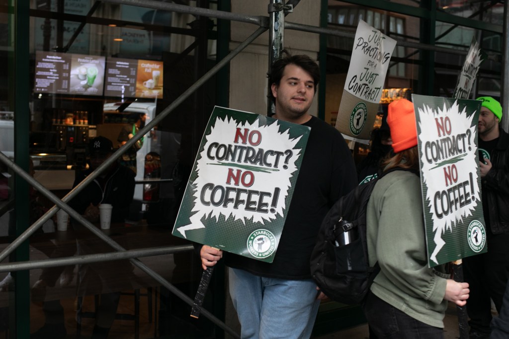 Unionized baristas picket outside a FiDi Starbucks,