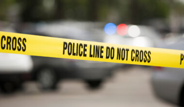 Man found dead in Queens apartment complex parking lot with stab wound; investigation into his death underway
