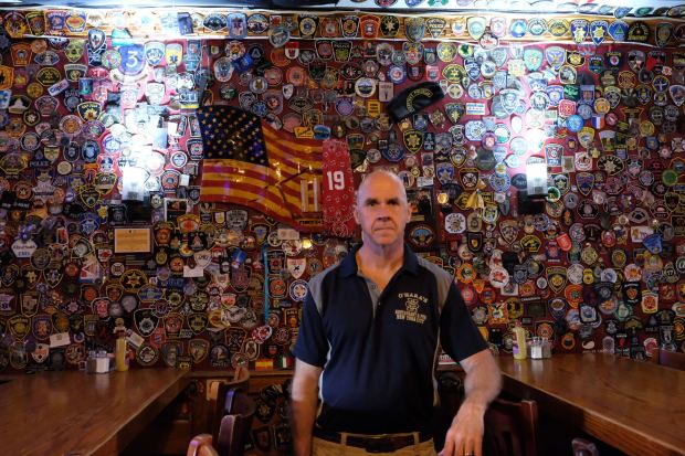 Mike Keane, 63, is pictured in O'Hara's Restaurant & Pub on Cedar St. in Manhattan on August 2026. (Emma Seiwell / New York Daily News)