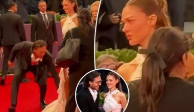 Brooklyn Beckham and Nicola Peltz caught in icy red carpet exchange