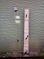 Bystander helps Moses Lake man out of submerged truck