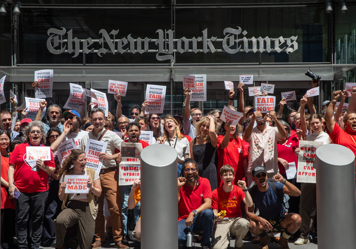 Unionized staff at the New York Times protest in front of the company's offices in NYC.