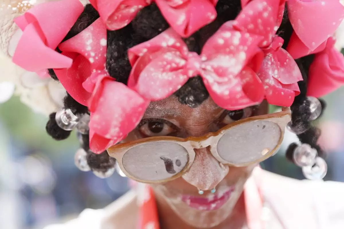 Members of the Belmont Baby Dolls pose for a photo as they wait for the start of the West Indian Day Parade on Monday, Sept. 7, 2026, in the Brooklyn borough of New York. (AP Photo/Heather Khalifa)