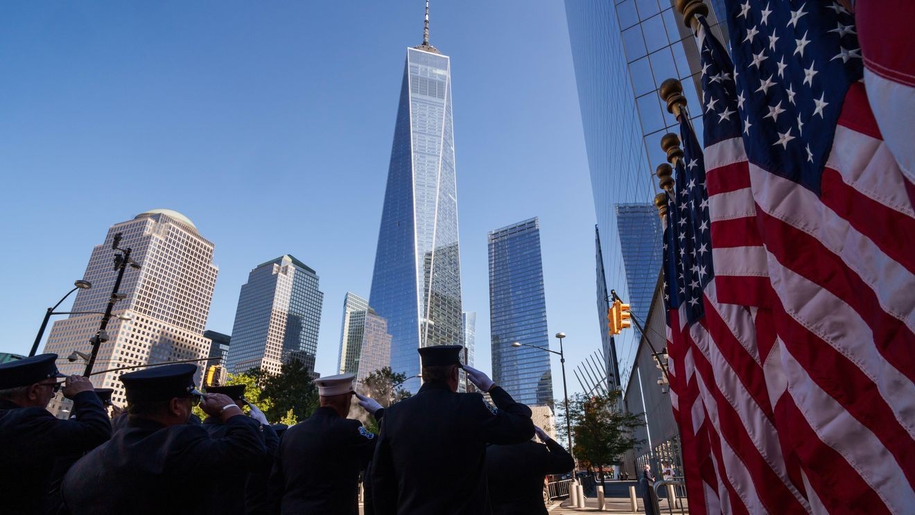 NEW YORK, NEW YORK - SEPTEMBER 11: Firefighters observe a moment of silence outside of Firehouse, Engine Company 10 and Ladder Company 10, during the annual 9/11 Commemoration Ceremony at the National 9/11 Memorial and Museum on September 11, 2025 in New York City. Government officials joined family, friends, and first responders as they gathered at Ground Zero honoring the lives of their loved ones on the 24th anniversary of the terror attacks of September 11, 2001, at the World Trade Center. (Photo by Adam Gray/Getty Images)