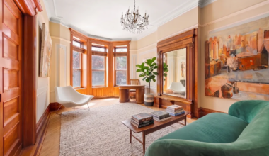parlor with pier mirror, wood floor