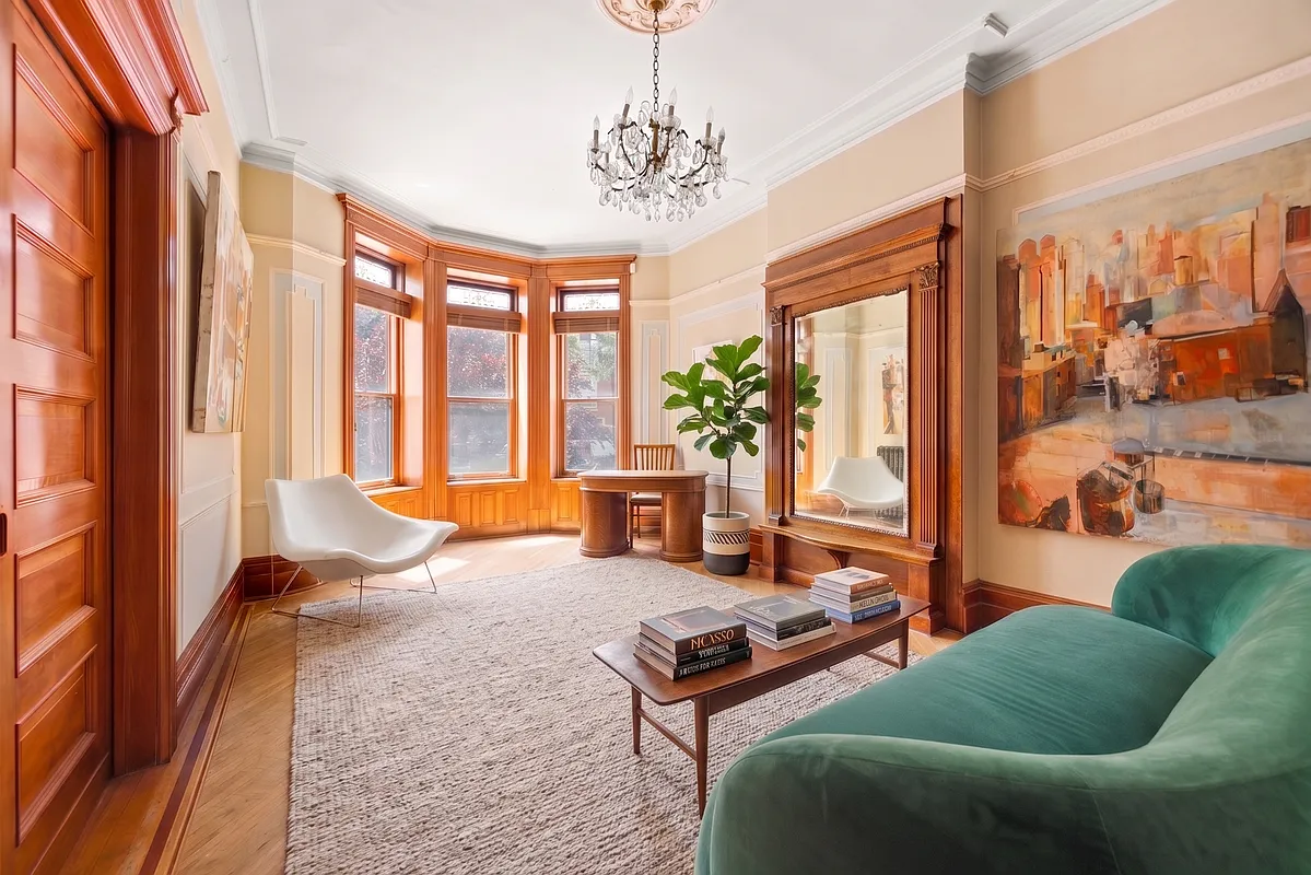 parlor with pier mirror, wood floor
