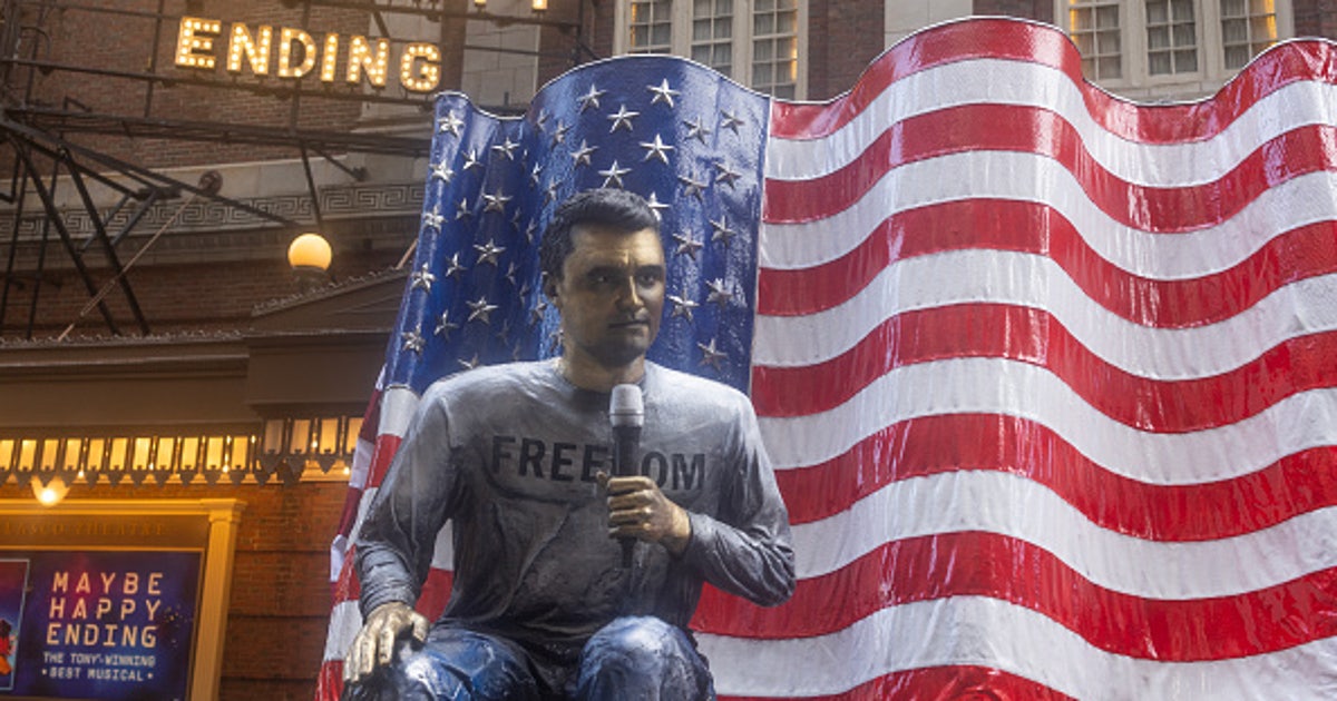 Charlie Kirk life-size statue displayed in Times Square on death anniversary
