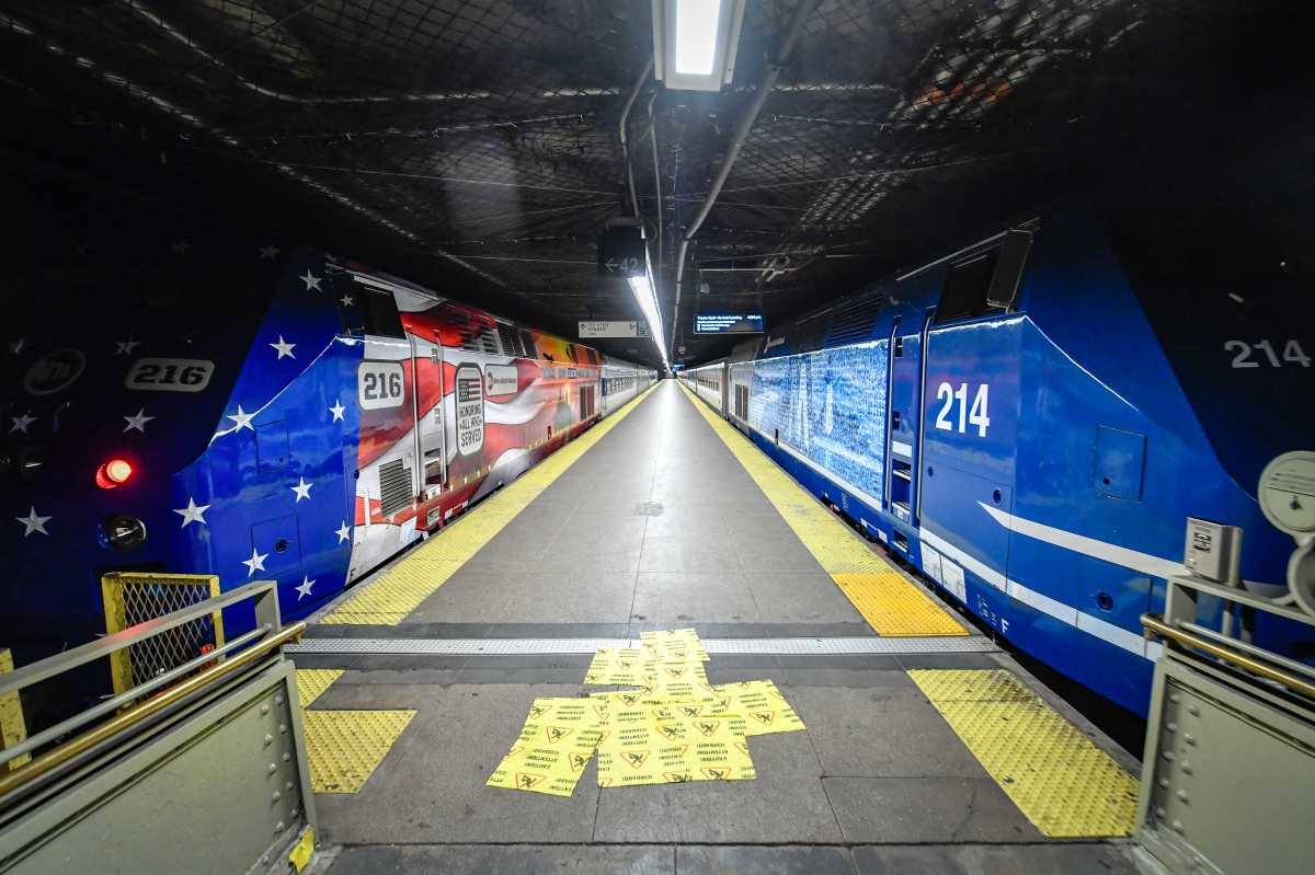 Woman accused of causing panic on Metro-North train with gun threat at Grand Central Station booked on felony charges