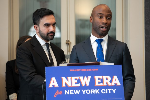 Schools Chancellor Kamar Samuels, right, speaks at the Charles A. Dana Discovery Center in Manhattan on Wednesday, Dec. 31, 2025, after Mayor Zohran Mamdani, left, appointed him to the position. (Barry Williams/ New York Daily News)