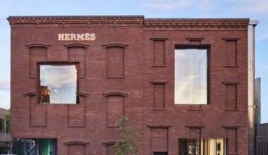 The exterior of the new Hermès Williamsburg store, including its brick facade and wide windows