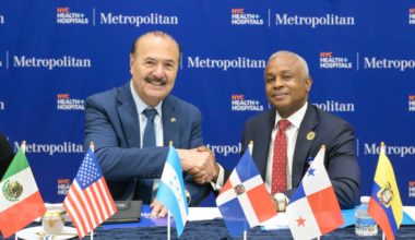 From left, Marcos Bucio Mújica, Consul General of Mexico in New York, and Julian John, CEO of NYC Health + Hospitals/Metropolitan, shake hands during the 2026 Met Nation Summit. Photo by Damien Kim for Metropolitan Hospital.