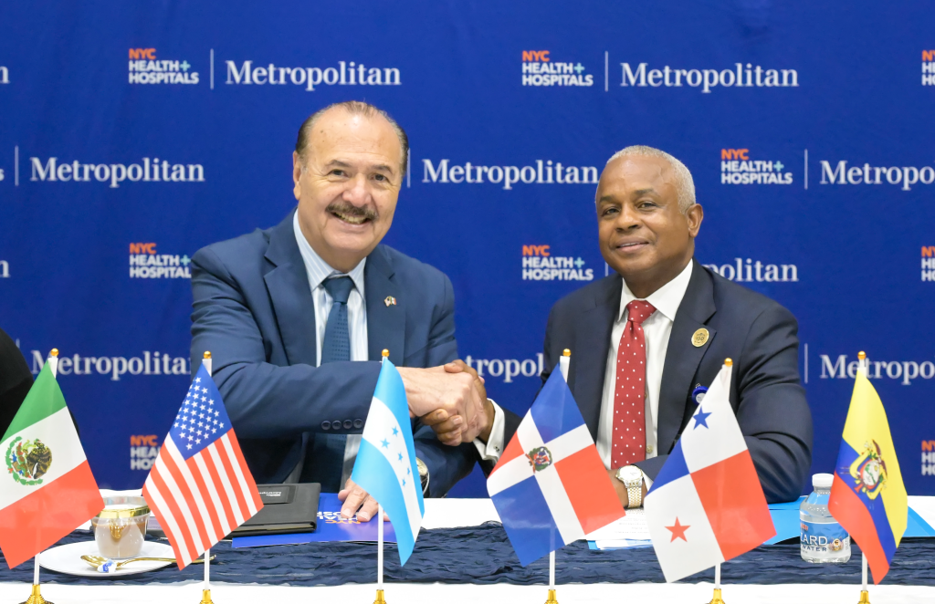 From left, Marcos Bucio Mújica, Consul General of Mexico in New York, and Julian John, CEO of NYC Health + Hospitals/Metropolitan, shake hands during the 2026 Met Nation Summit. Photo by Damien Kim for Metropolitan Hospital.