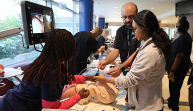 Staff participate in hands-on simulation training during Healthcare Simulation Week at NYC Health + Hospitals/Kings County.