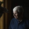 Erik Jensen, 67, is seen at his home in Warrenton, Ore. He served in the Navy for 30 years before retiring in 2007. While veterans are entitled to free support from accredited services to navigate their disability benefits, Jensen sought out the services of Trajector Medical. The company charged him $12,000.