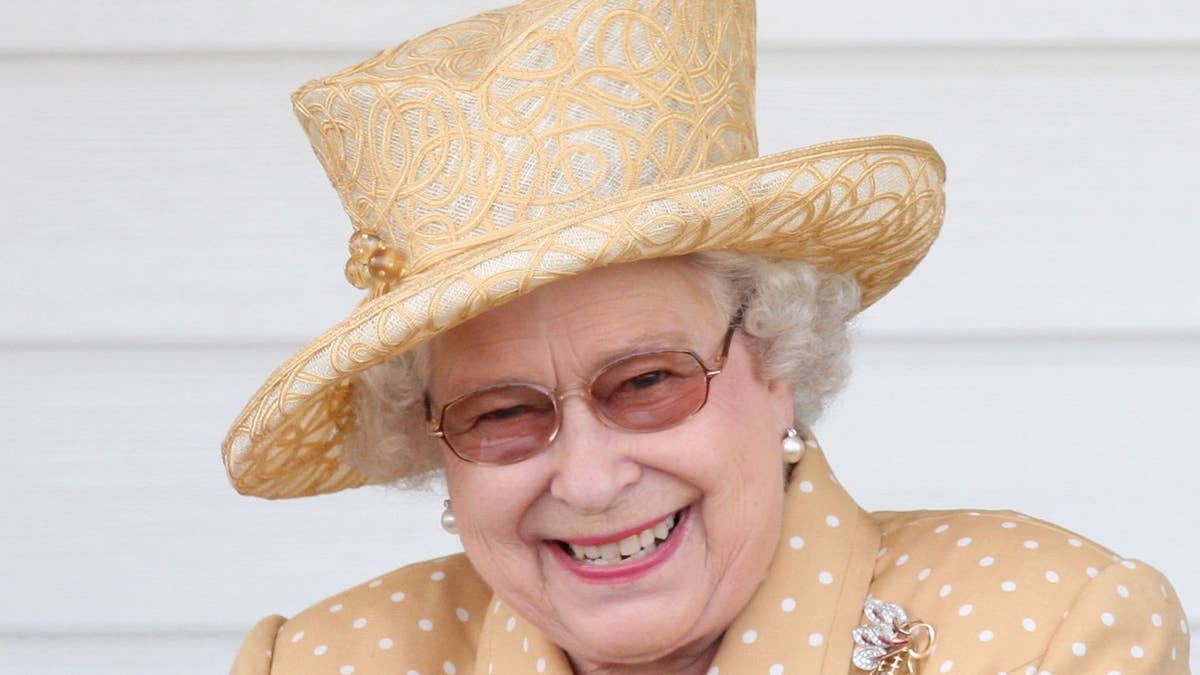 Queen Elizabeth's unfortunate mishap as she's presented with flowers caught on camera