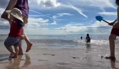 Coney Island beachgoers soaking it in before school starts again
