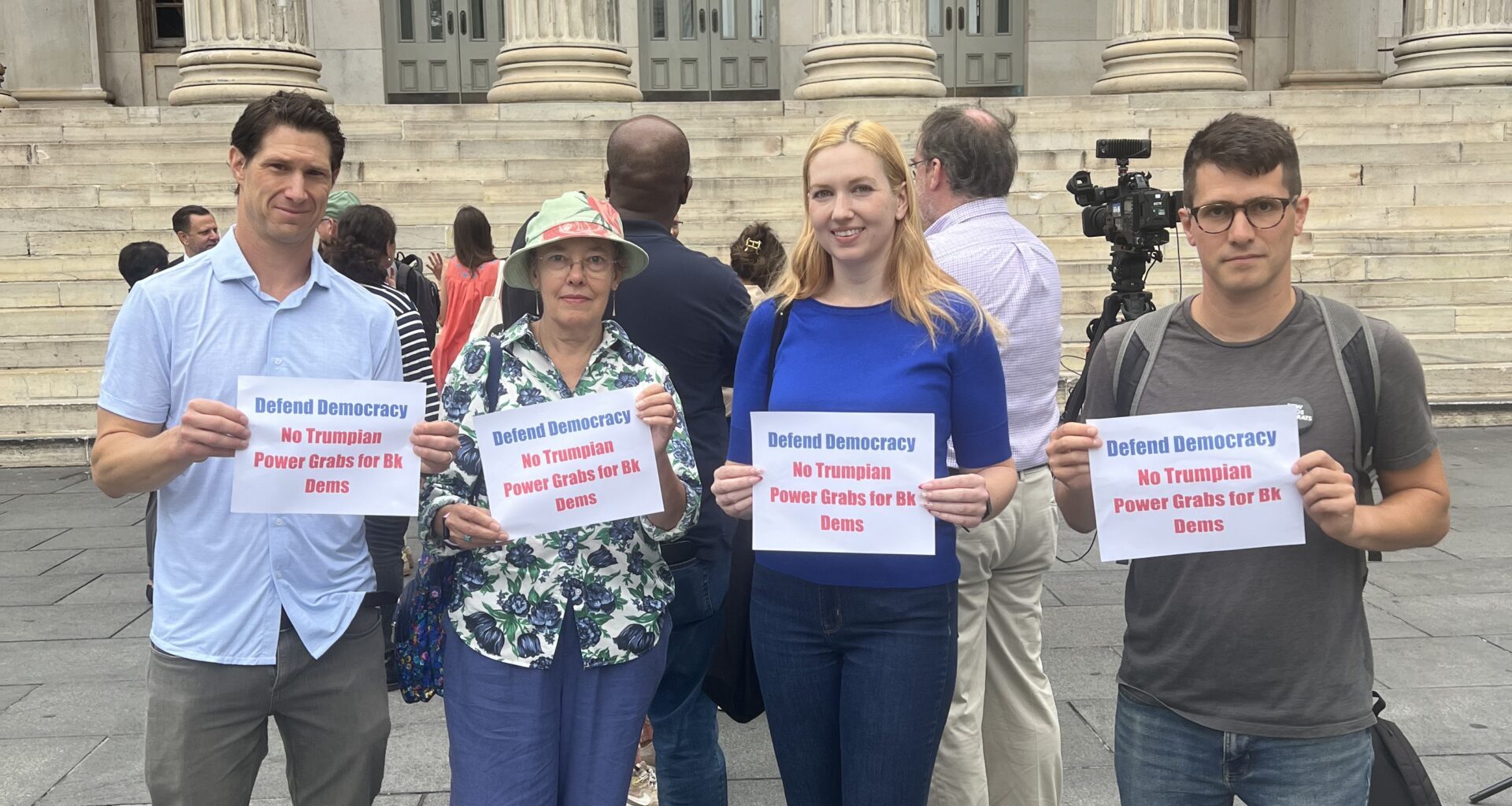 Members of the New Kings Democrats, a political reform organization, at a recent press conference outside of Brooklyn Borough Hall. Photo: Wayne Daren Schneiderman/Brooklyn Eagle