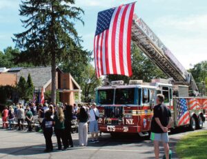 It was a day of remembrance at St. Michael’s Cemetery as they once again hosted its cherished “Remember Me Run and Walk,” honoring the nearly 3,000 lives lost on September 11, 2001 and the many first responders and recovery workers who later succumbed to illnesses linked to their service at Ground Zero. Over the years, St. Michael’s Cemetery has hosted annual September 11 remembrance events, bringing together families, first responders, and community members. In addition, St. Michael’s has erected monuments honoring the NYPD, PAPD, all 343 Firefighters lost that day, and a First Responders monument. Today’s event serves as a powerful reminder that the lives lost on September 11—and the heroes who answered the call in its aftermath—will always be remembered.