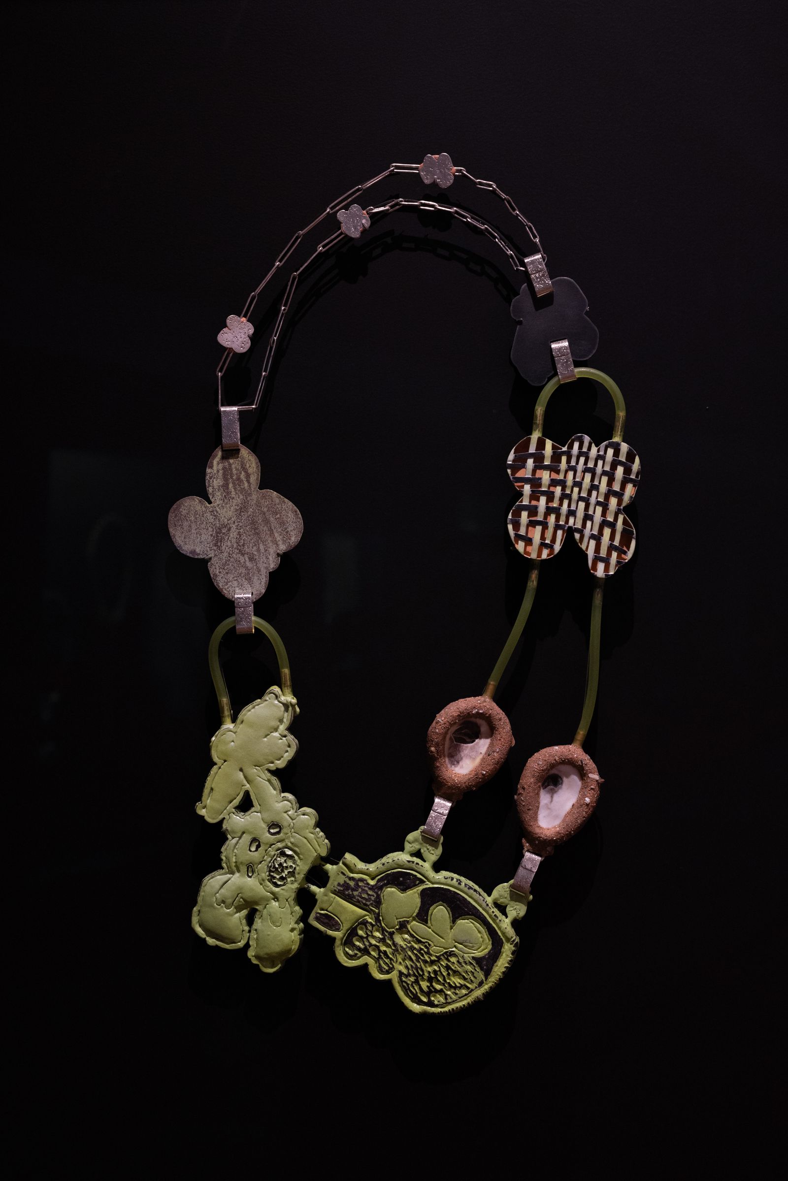 Image may contain Accessories Earring Jewelry Bracelet Necklace Art and Handicraft