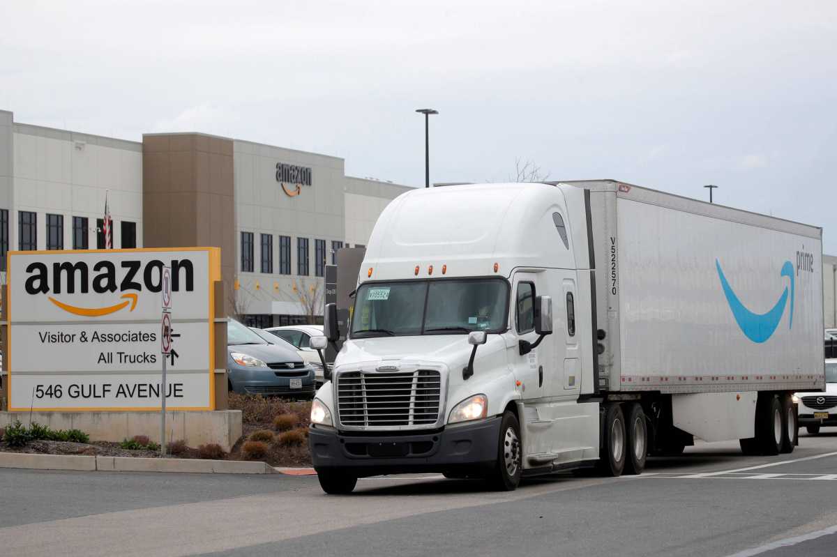 An Amazon truck exits the company's JFK8 distribution center in Staten Island, Nov. 25, 2020.  