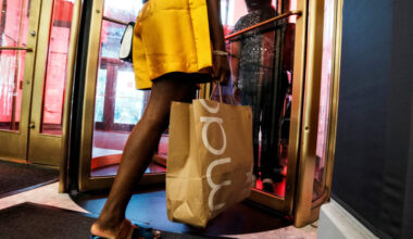 FILE PHOTO: People shop at Macy’s department store in Manhattan in New York
