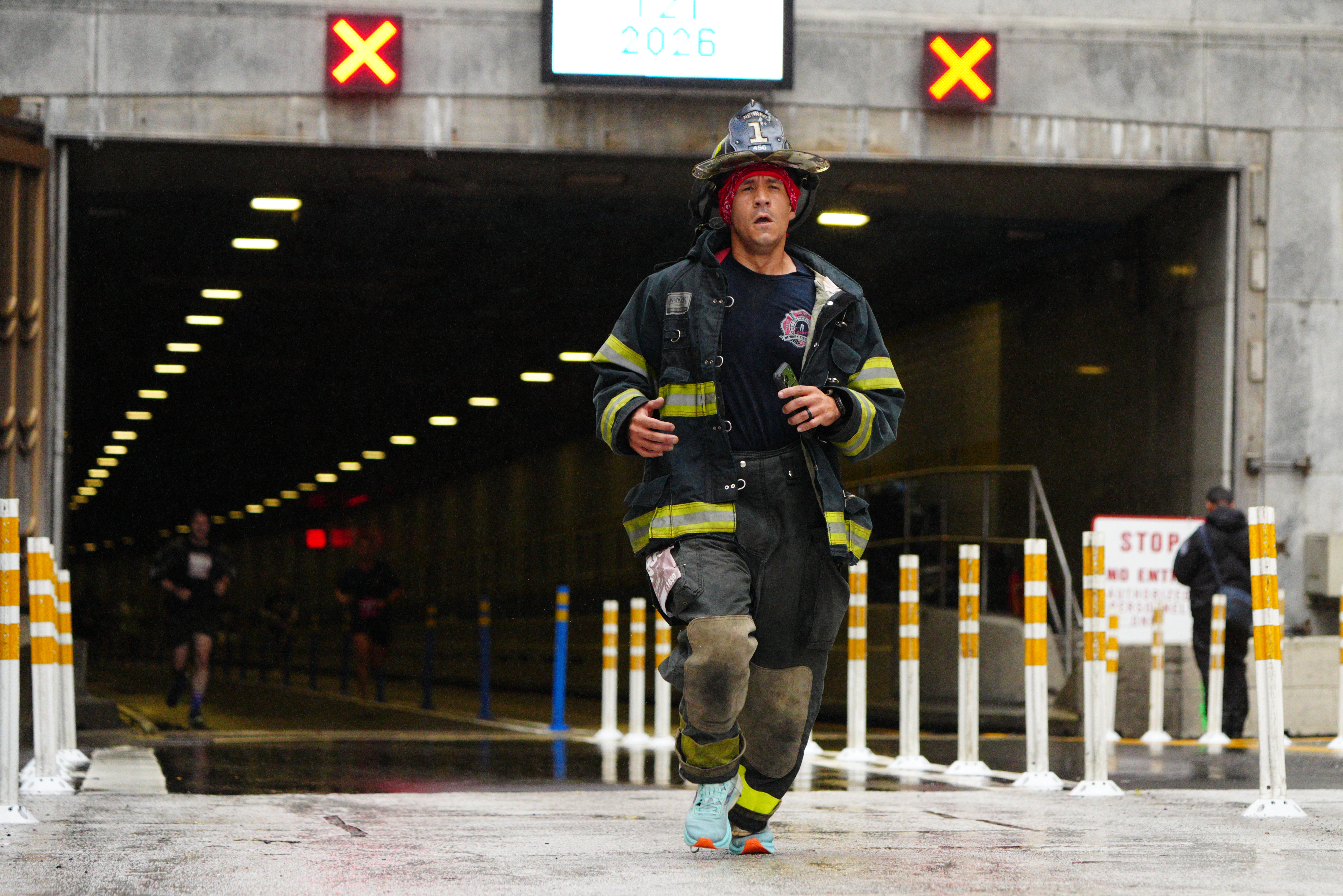 A firefighter running the Tunnel to Towers NYC 5K Run & Walk.