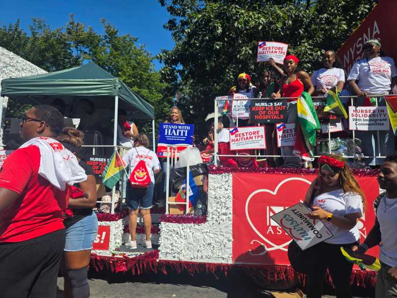 The New York State Nurses Association (NYSNA) marches with a decorative float carrying a message of support for Temporary Protected Status (TPS) and solidarity with immigrants during the West Indian Day Parade in Brooklyn, N.Y., on Sept. 7, 2026. Photo by Darlie Gervais for The Haitian Times