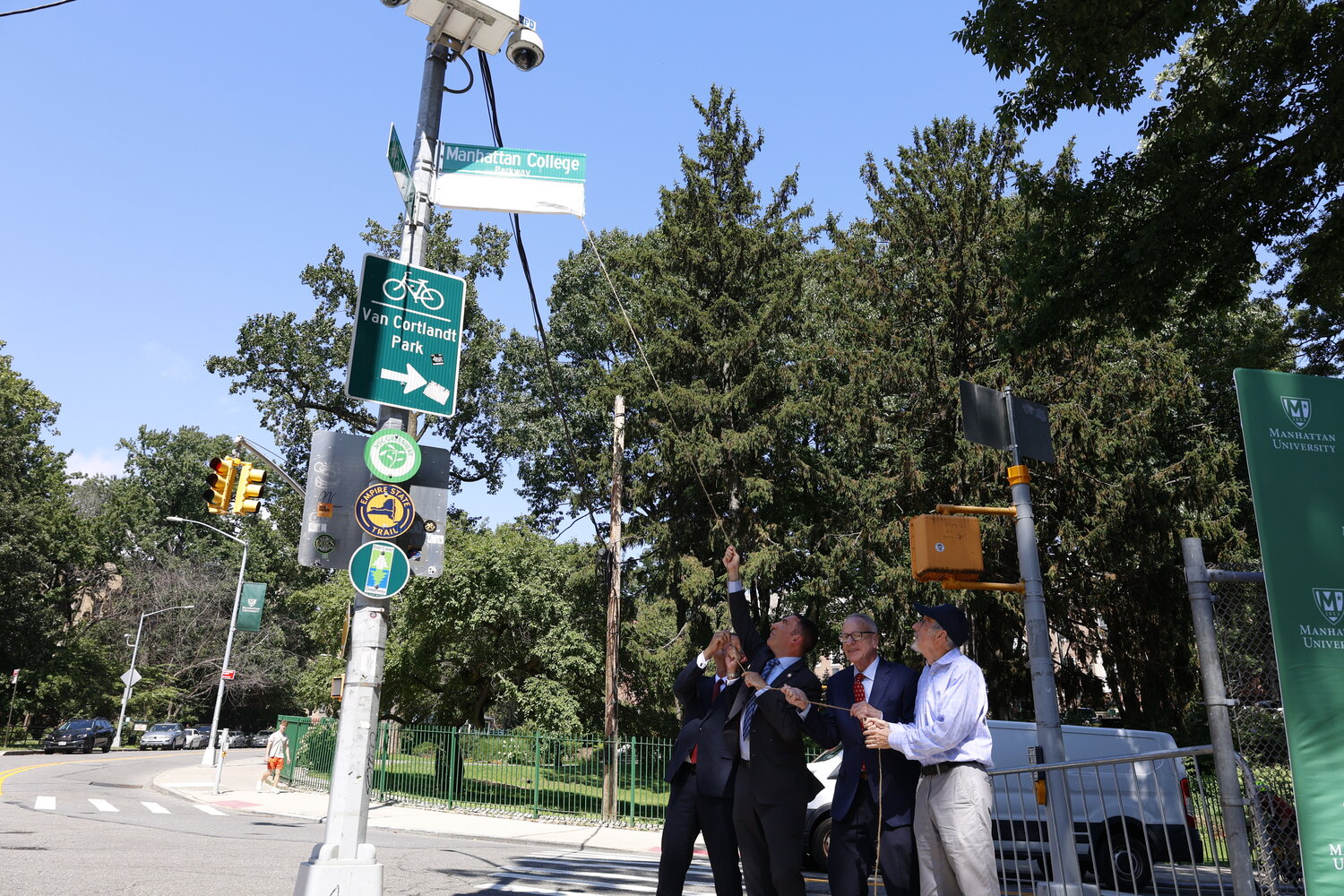 Manhattan University President Frederick Bonato, Council member Eric Dinowitz, Assembly member Jeffrey Dinowitz and Community Board 8 Vice Chair Bob Bender.