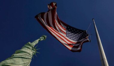 The America flag and New York-New-York’s replica Statue of Liberty are photographed duri ...