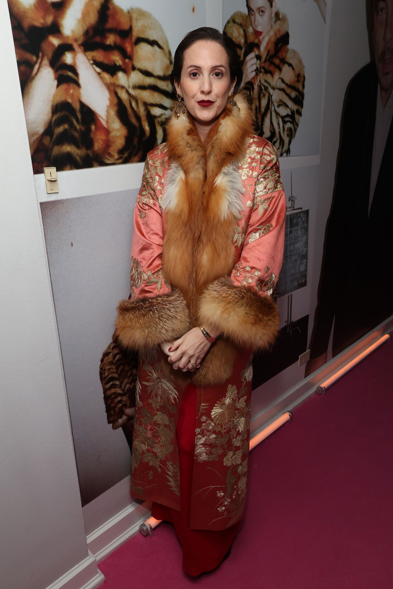Image may contain Person Clothing Fur Adult and Coat