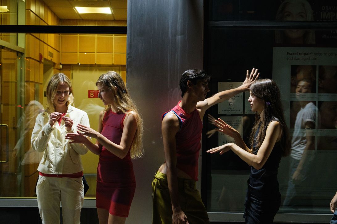 Pre-show model chatter outside of Eckhaus Latta.